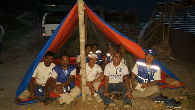 The author and his team spends the night in a makeshift tent in Sindhupalchok due to the aftershocks caused by the May 12 earthquake. Photo from Plan International 