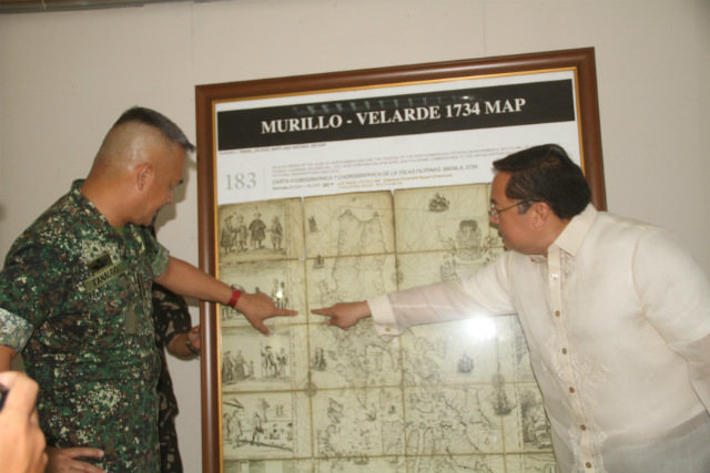 'SCARBOROUGH IS OURS.' The Northern Luzon Command on June 6, 2016, receives a framed replica of the 1734 Murillo Map that shows the disputed Panatag Shoal (Scarborough Shoal) as part of the Philippines. Photo courtesy of Northern Luzon Command 