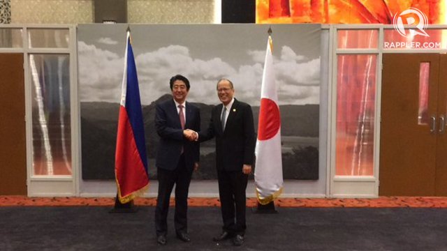 BILATERAL MEETING. President Benigno Aquino III and Japan Prime Minister Shinzo Abe reaffirm the 'deepening' of their strategical partnership during a bilateral meeting held at the sidelines of the APEC Summit. Photo by Camille Elemia/Rappler   