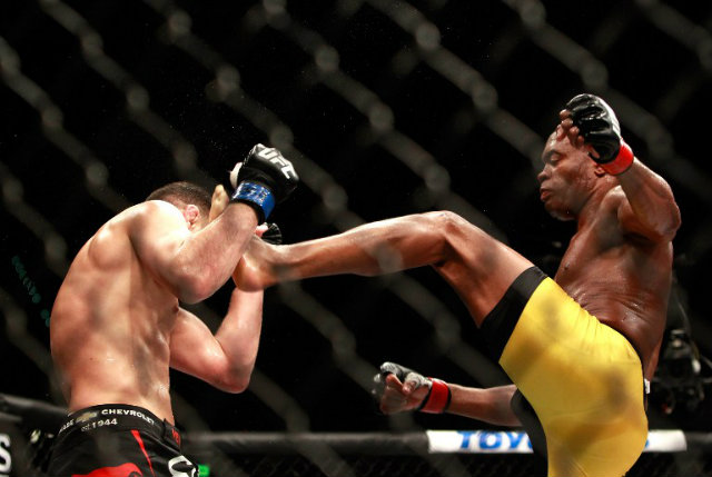 Anderson Silva lands a kick to Diaz's face. Photo by Steve Marcus/Getty Images/AFP
 <span class=