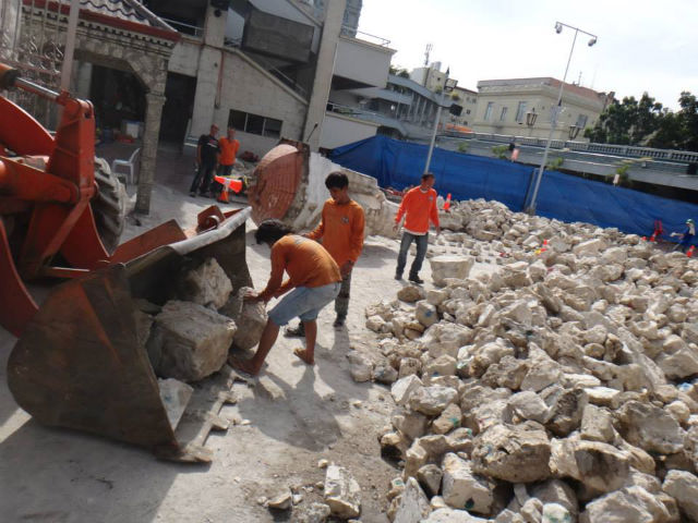 SORTINGS AND TRANSFERS. Sorted rubble being transfered to storage site 20 minutes away from Basilica