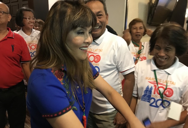 EARLY START. Barangay officials dressed in 'Marcos Latta (Marcos Pa Rin)' welcome Imee Marcos during her visit to the 15th Liga ng Mga Barangay -Cagayan Congress in Clark, Pampanga. Photo by Raymon Dullana/Rappler  