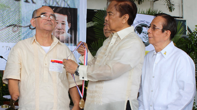 Lovely is awarded the Ninoy Aquino Medal of Valor during the commemoration of the 29th Death Anniversary of Ninoy Aquino in 2012. The ceremony was organized by the Ninoy Aquino Movement members in the Philippines. (L-R) Lovely, Heherson Alvarez and Raul Daza. 
