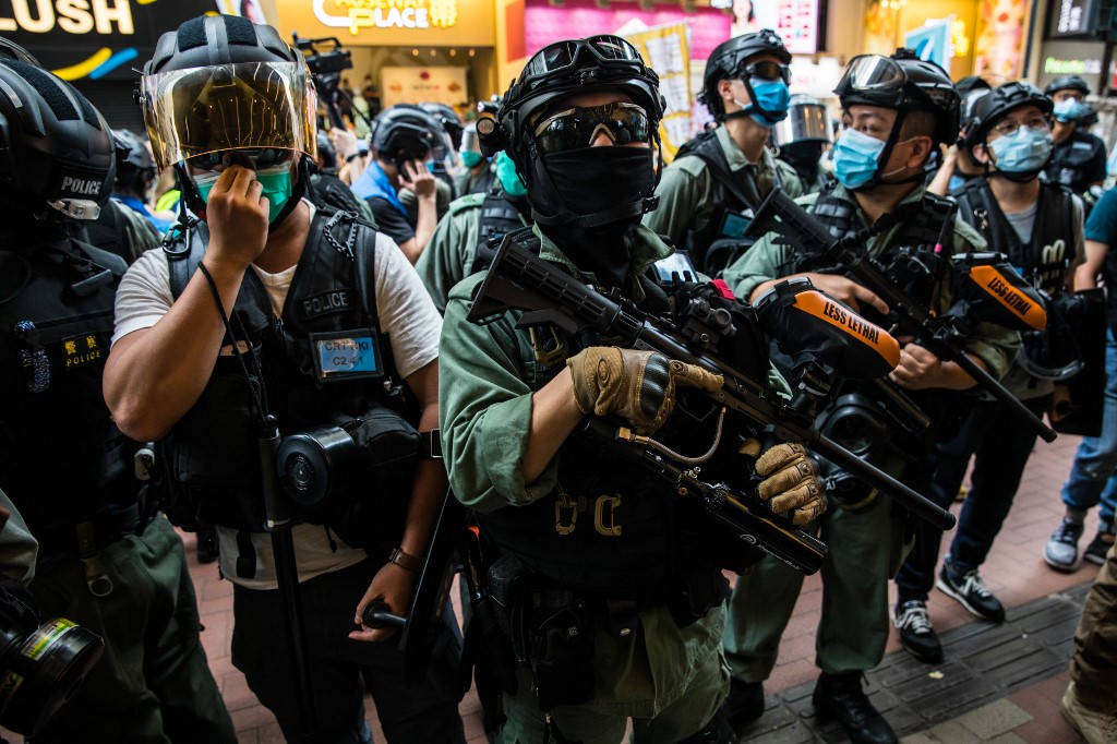 ALL-MIGHTY. Riot police clear a street as protesters gathered to rally against a new national security law in Hong Kong on July 1, 2020, on the 23rd anniversary of the city's handover from Britain to China. Photo by Dale de la Rey/AFP  