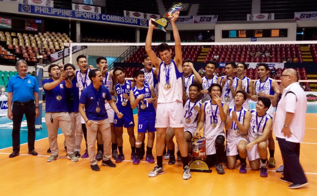 FINALS MVP. The 6-foot-8 Tony Koyfman raises his Finals MVP trophy after scoring 27 points in both Spikers