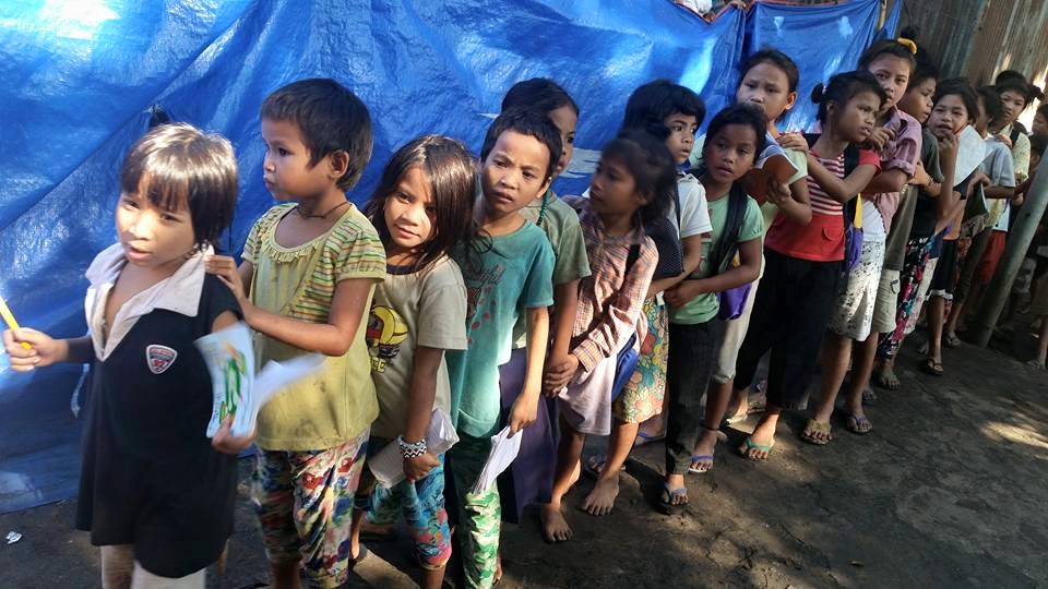 LUMAD CHILDREN. Indigenous children line up before their class starts, a few hours before cops attempted to enter their evacuation site inside a Protestant church compound in Davao City on July 23, 2015. Photo by Glades Maglunsod 