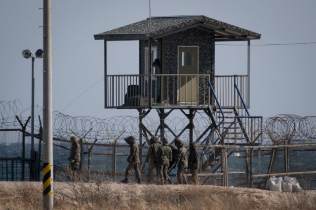 POST. File photo of a a guard post near a barbed wire fence on a beach near Goseong on South Korea's northeast coast. File photo by Ed Jones/AFP 