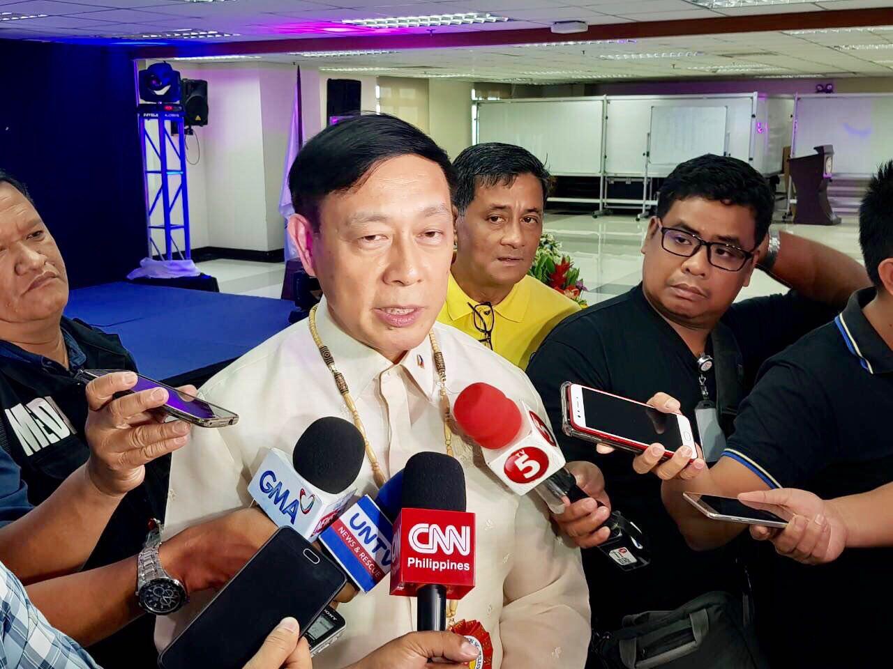 NO SHARING. DILG OIC Catalino Cuy faces reporters after the 51st Napolcom Anniversary. Sourced photo 