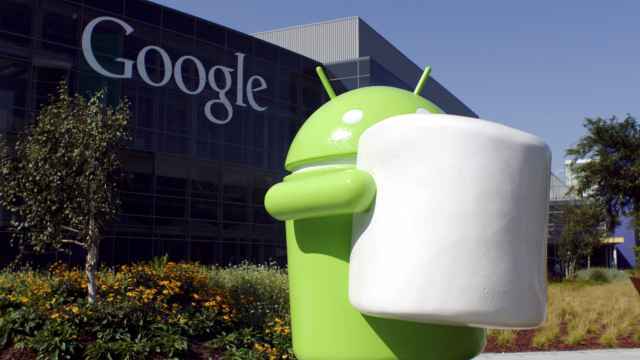 Logo robot Android sedang memegang sebuah marshmallow. Foto oleh: GOOGLE/EPA