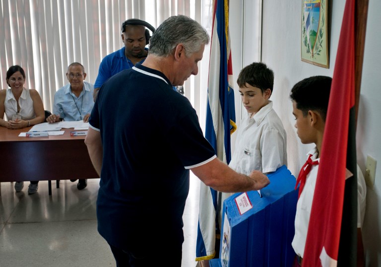 REFERENDUM. Cuban President Miguel Diaz-Canel casts his vote in the referendum for the new Cuban Constitution in Havana, on February 24, 2019. Photo by Ramon Espinosa/Pool/AFP) 