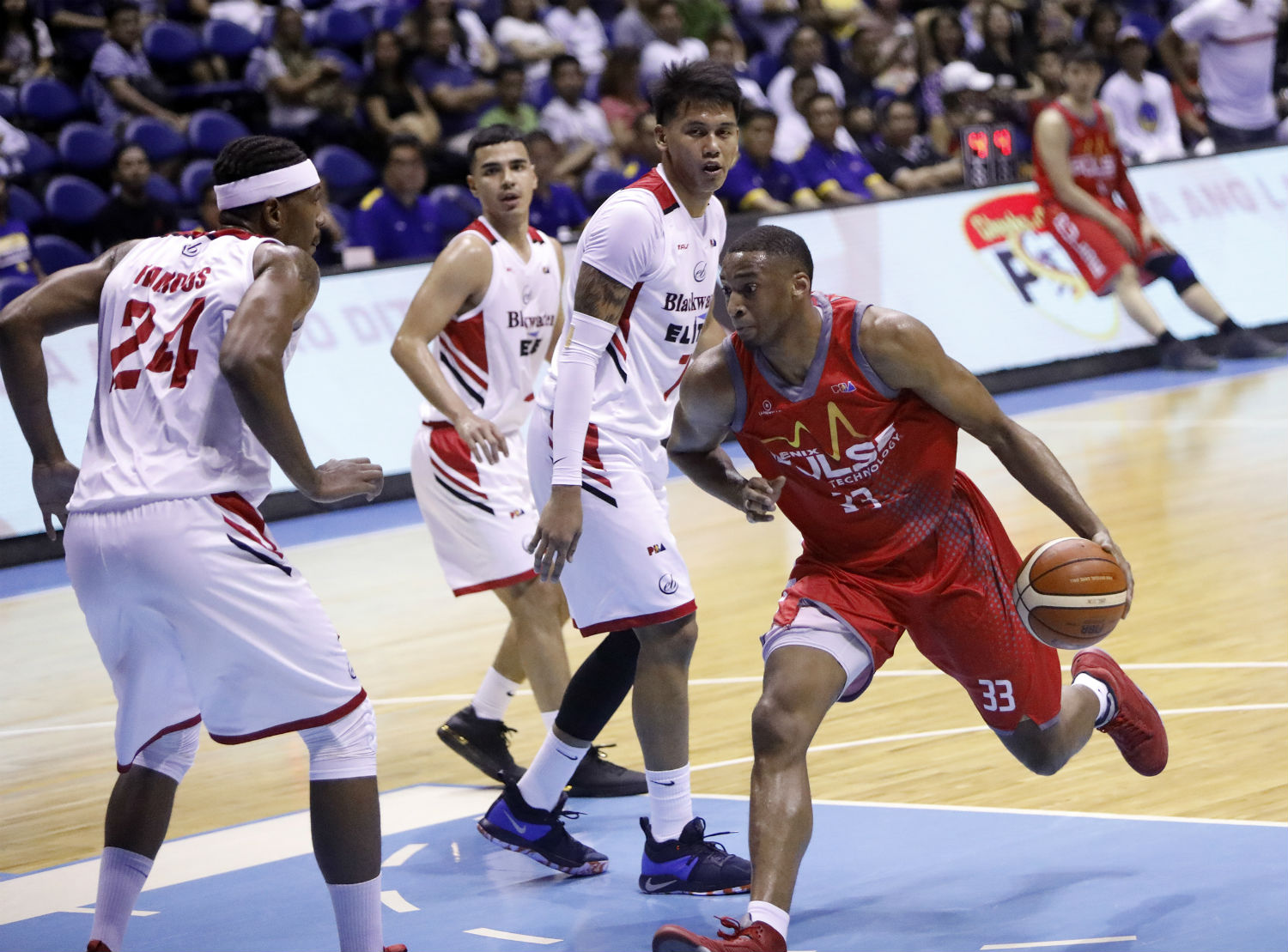 NO STOPPING. James White (33) shrugs off cramps on the way to finishing with 31 points, 14 rebounds, 5 assists, 5 blocks and two steals in the Phoenix Fuel Masters' 107-102 win over the Blackwater Elite. Photo by PBA Images 