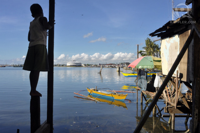 STILL WAITING. Yolanda survivors count on the government for help even as rehabilitation efforts suffer from too much bureaucracy. File photo by LeAnne Jazul/Rappler