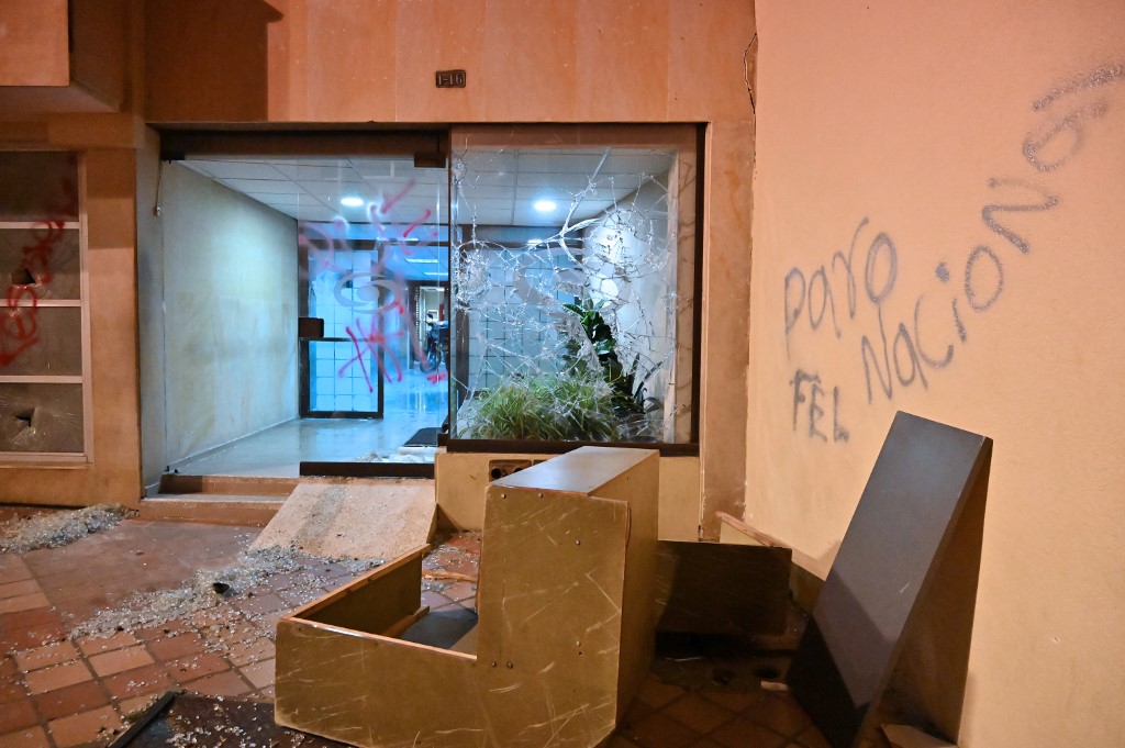 AFTERMATH. View of a vandalized bank after protests during a nationwide strike called by students, unions and indigenous groups to protest against the government of Colombia's President Ivan Duque in Cali, Colombia, on November 21, 2019.
LUIS ROBAYO / AFP  