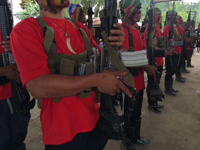 PEACE TALKS. This file photo shows members of the New People's Army in Maco, Compostela Valley. File photo by Mick Basa  