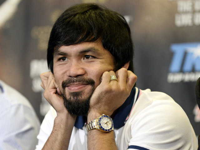 BACKLASH. Manny Pacquiao's controversial comment on same-sex marriage draws flak from the LGBT community. File photo by Andrew Gombert/EPA   