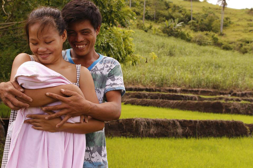 CHILD CARE. Jonamae and Christian with their baby, CJ. Photo by Ana Santos