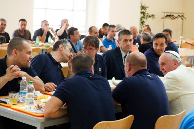 'POPE OF THE DOABLE.' Pope Francis (R) eats lunch with employees at the Vatican in a move hailed as a show of simplicity. Photo by Osservatore Romano/AFP