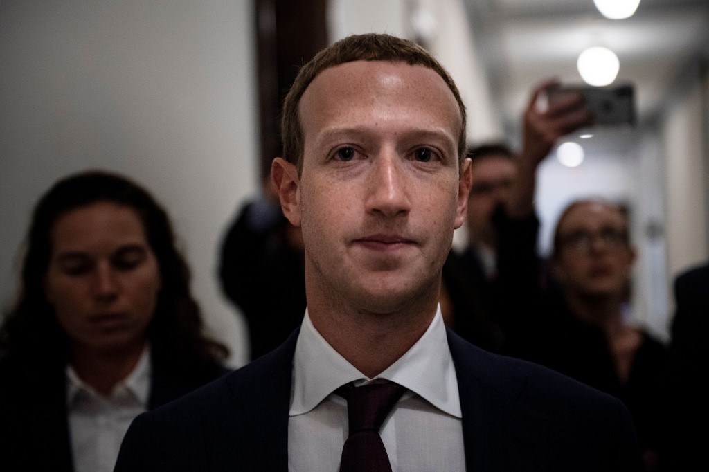 ZUCKERBERG. In this file photo taken on September 19, 2019 Facebook CEO Mark Zuckerberg walks to meetings for technology regulations and social media issues on Capitol Hill, in Washington, DC. Photo by Brendan Smialowski/AFP 