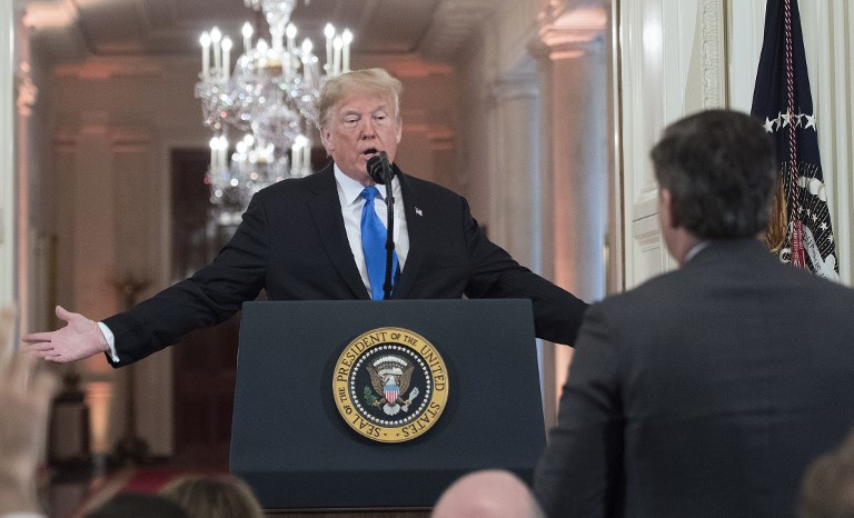 CONFRONTATION. In this file photo taken on November 7, 2018 US President Donald Trump gets into a heated exchange with CNN chief White House correspondent Jim Acosta during a post-election press conference in the East Room of the White House in Washington, DC. Photo by Jim Watson/AFP 
