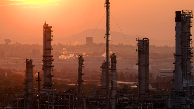 BATTERED INDUSTRY. An oil refinery. Photo from Shutterstock 