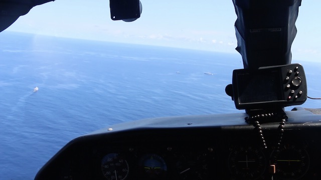 OVERFLIGHT. A Coast Guard islander plane accompanies deployment of Coast Guard ships to Scarborough Shoal 
