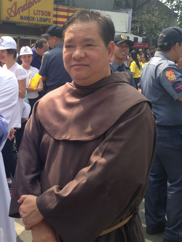 Fr Willy Benito, OFM, brings his parishioners to Luneta to see the Pope