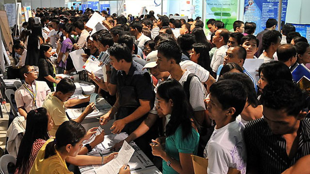 OPTIMISTIC. Filipinos are feeling optimistic about the economy. File photo by Agence France-Presse  