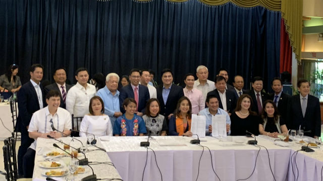 BICAM APPROVES. Lawmakers part of the bicameral conference committee pose for a picture after approving the 2019 budget on February 8, 2019. Photo from House committee on appropriations chair Rolando Andaya's office 