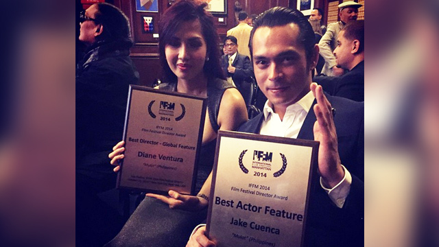 BEST ACTOR. Jake Cuenca holds his acting award with director Diane Ventura for the movie 'Mulat.' Photo from Instagram