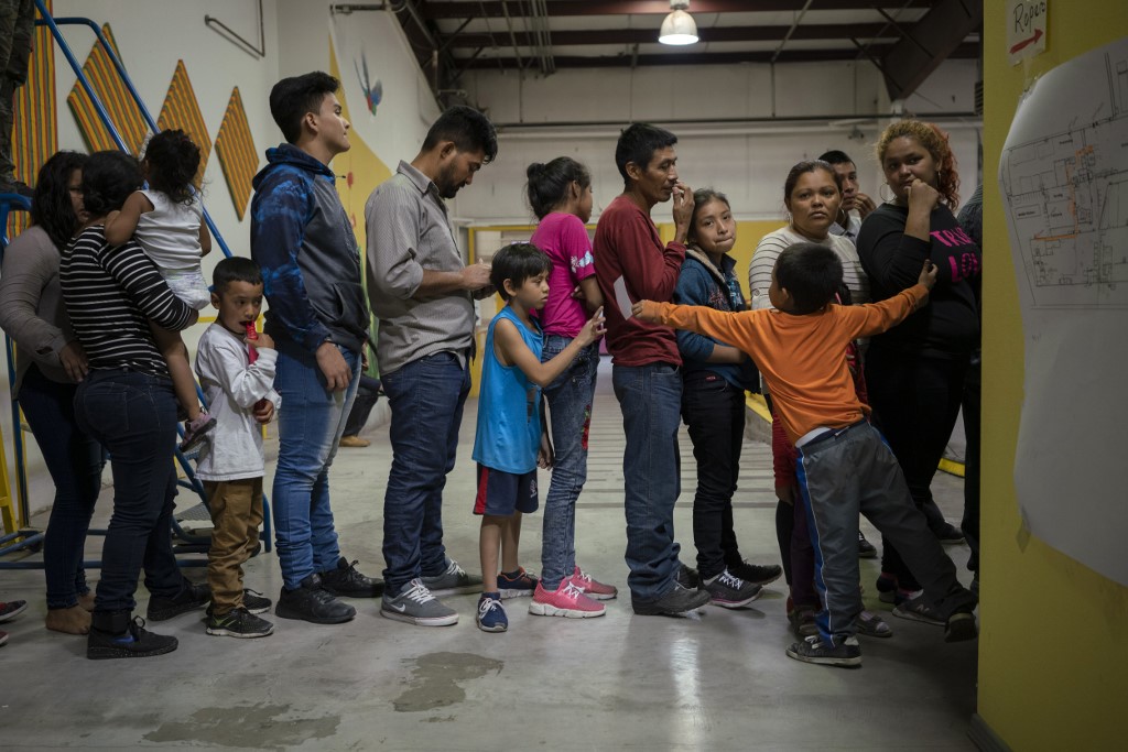 DETAINED. Migrant children from different Latin American countries wait to receive food at the Casa del Refugiado, a new center to help the large flow of migrants being released by the US Border Patrol and Immigration and Customs Enforcement in El Paso, Texas on April 24, 2019. Photo by Paul Ratje/AFP    
