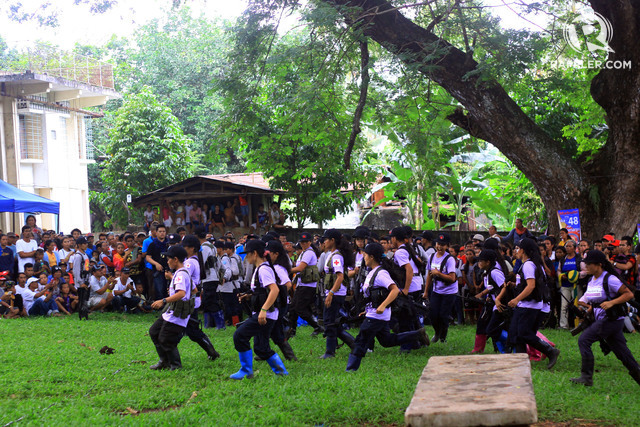 WOMEN FIGHTERS. A platoon of rebel women of the New People's Army in Northern Mindanao scramble for formation in Medina, Misamis Oriental on December 26, 2016. Photo by Bobby Lagsa/Rappler 