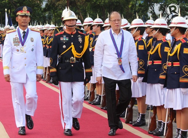 RETIREMENT. President Benigno Aquino III (right) troops the line at the retirement ceremony held for Philippine National Police Director General Ricardo Marquez (left) at Camp Crame on June 28, 2016. Photo by Joel Liporada/Rappler  