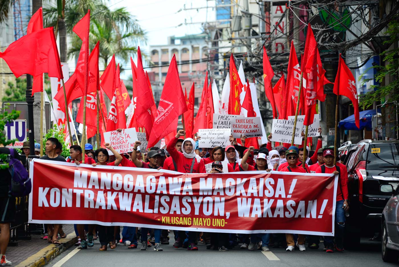 LABOR DAY. On May 1, 2018, thousands of workers march to Mendiola to protest against the executive order signed by President Rodrigo Duterte in Cebu. Photo by Maria Tan/Rappler 