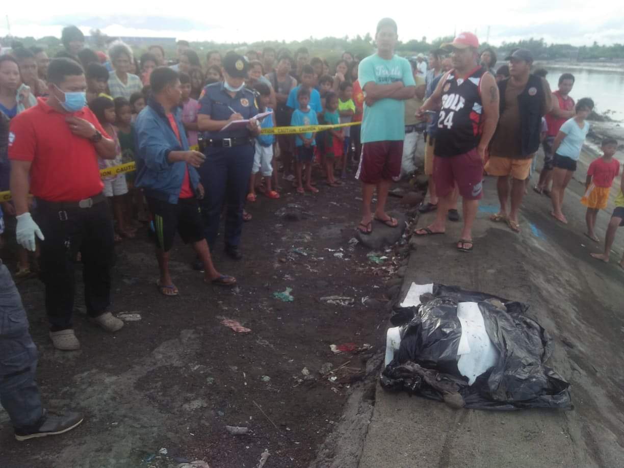 FOUND. The body of the 5-month-old boy, whose house was swept away in Barangay Taculing, Bacolod City on March 6, 2020, was found by a seashell gatherer the following morning in Barangay 35. Photo courtesy by Bacolod Police Station 1 