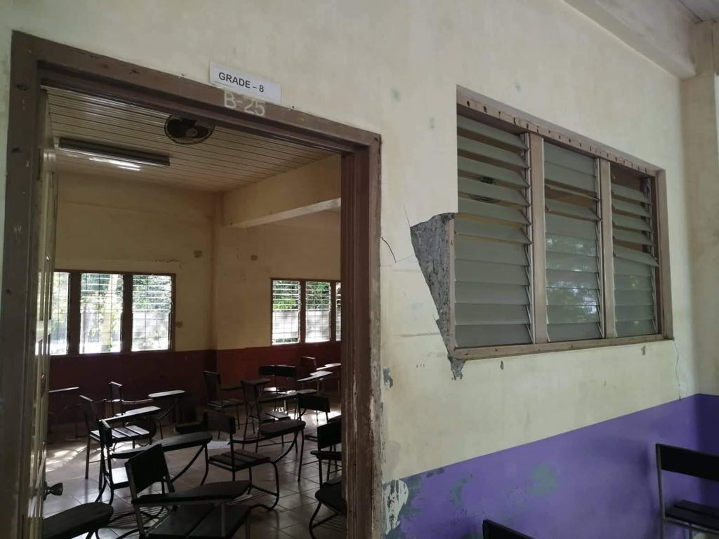 FOR REPAIR. One school building was limited to restricted use while another was deemed unsafe. Photo from QC DRRMC 