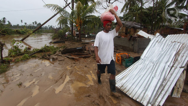 COVERED IN MUD. This is what typhoon "Pablo" did to many towns in the province. Photo by Karlos Manlupig