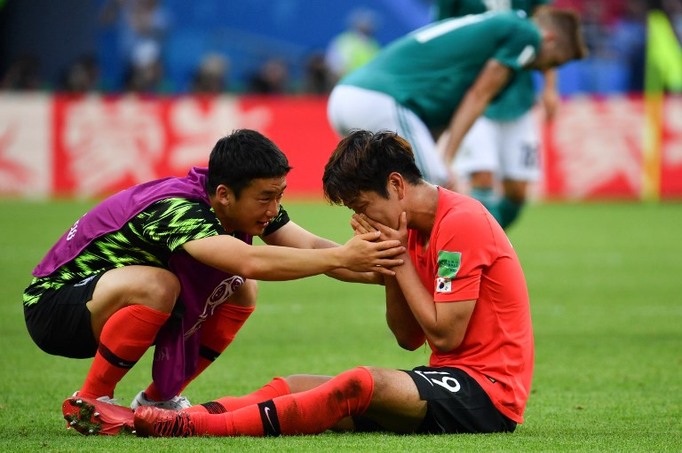 BITTERSWEET. South Korea can’t quite relish its monumental win. Photo by Saeed Khan/AFP 