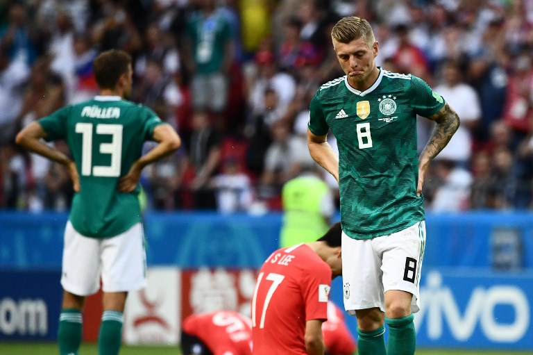 SHOCK EXIT. Germany's midfielder Toni Kroos (right) and the defending champions absorb a stunning loss to the unfancied South Koreans. Photo by Jewel Samad/AFP    