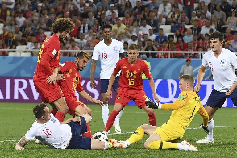 STRONG START. Belgium (in red) downs England, 1-0, in their final group game to join Croatia and Uruguay as the only teams to win all 3 matches in the group stage. Photo by Attila Kisbenedek/AFP  