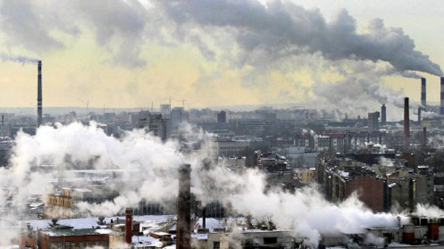 GREENHOUSE GAS EMISSIONS. In this file photo, smoke from the chimneys billow over St. Petersburg in Russia, March 3, 2005.
File photo by Sergey Kulikov/Interpress/AFP   