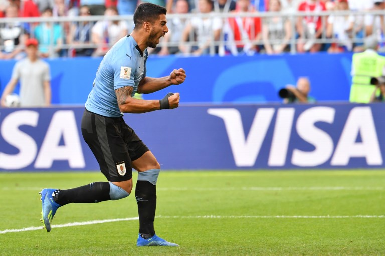 ON TOP. Uruguay forward Luis Suarez opens the scoreline with a free kick that beautifully made to the back of the net. Photo by Emmanuel Dunand/AFP 