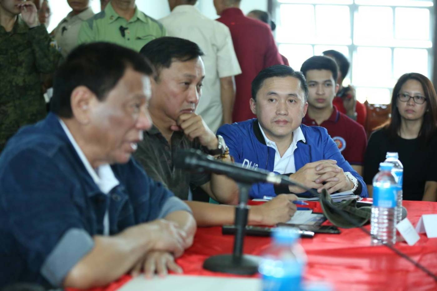 DUTERTE'S SUPPORT. Presidential Political Adviser Francis Tolentino sits beside President Rodrigo Duterte during a Typhoon Ompong situation briefing in Tuguegarao City, Cagayan. Malacañang photo 