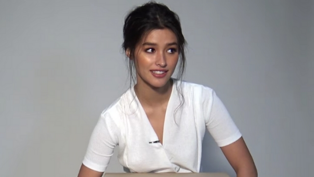 FEARLESS. Liza Soberano stays calm even as an insect crawls up her arm. Screenshot from Facebook.com/TechnoMarinePH 