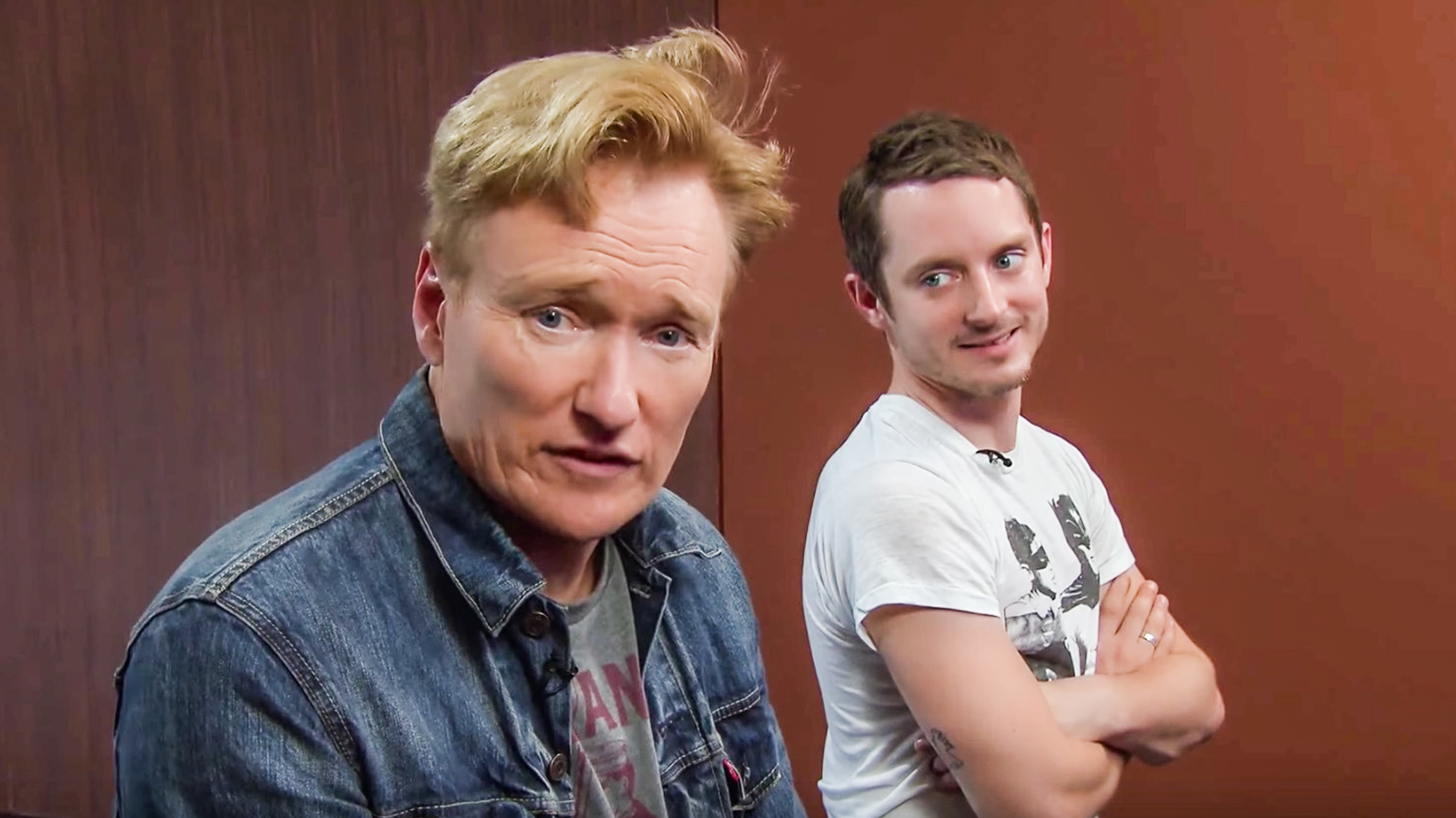 'CLUELESS GAMER.' Conan O'Brien and Elijah Wood try out 'Final Fantasy XV' before it drops. Screengrab from YouTube/Team Coco 