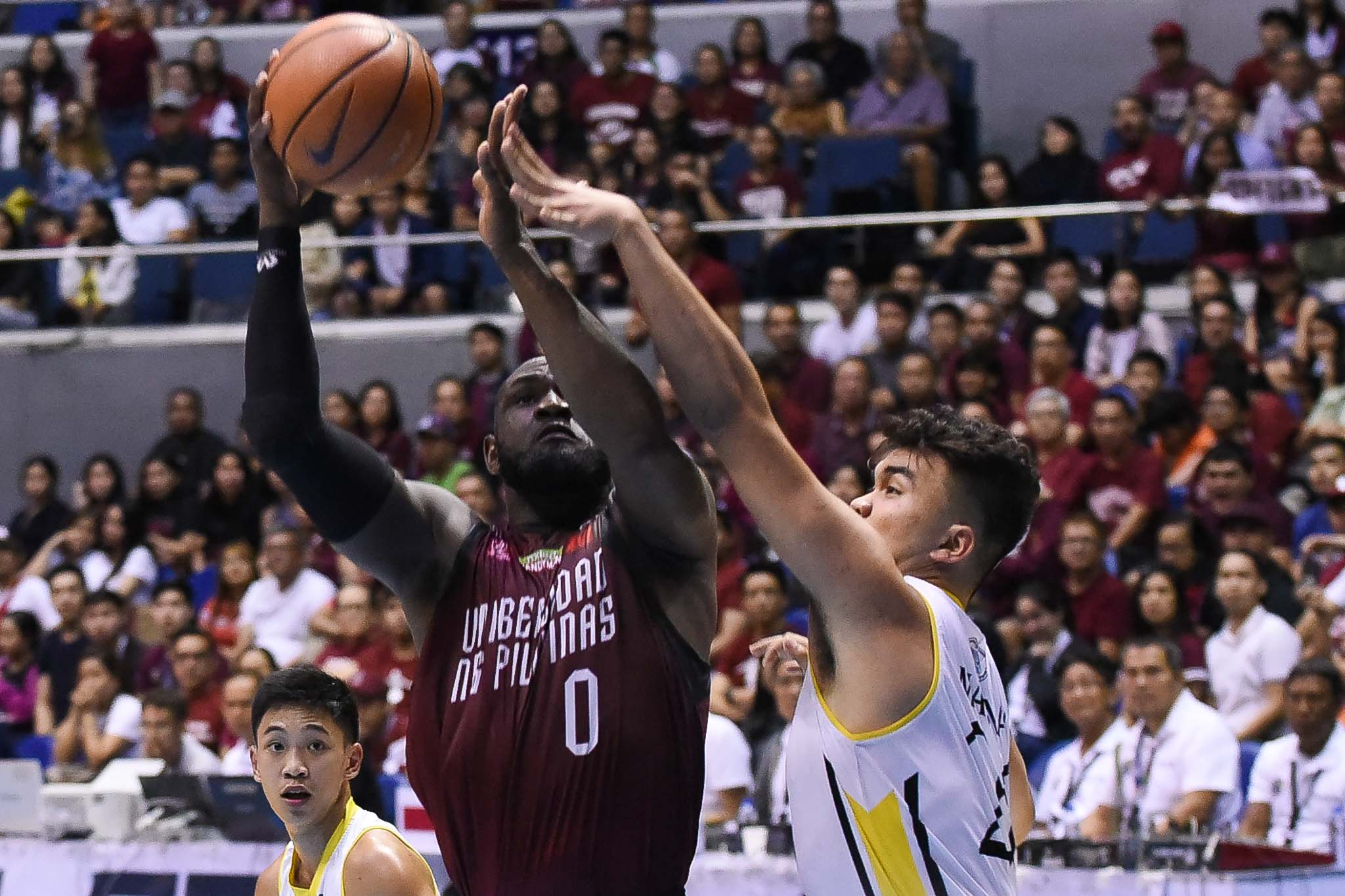STAT-STUFFER. UP's Bright Akhuetie drops another huge double-double. Photo by Joaquin Flores/Rappler  