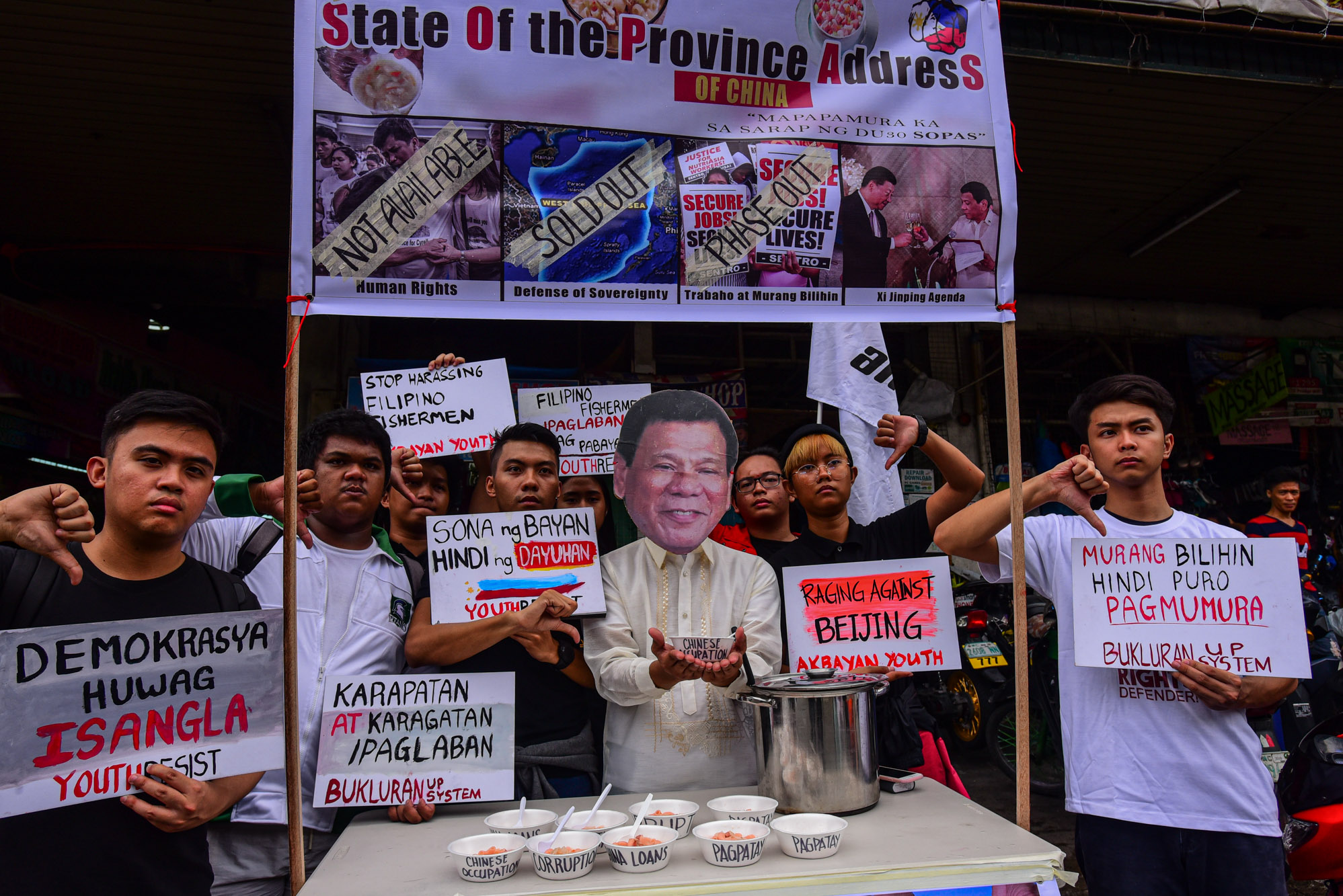 STATE OF THE NATION. Youth leaders from various organization assemble for an alternative SONA at Nepa Q MArt in Cubao, Quezon City to hit President Duterte's continued pro-China policies. Photo by Maria Tan/Rappler