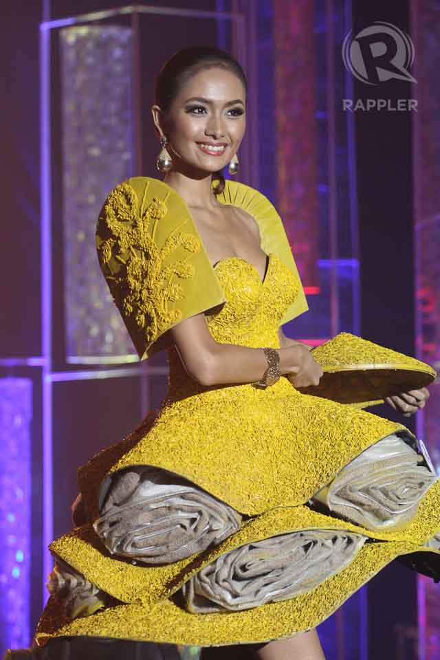 RICE INSPIRATION.  Ma Teresita Alaine Baccay in a bright yellow modern terno by Abbog Ocampo. File photo by Manman Dejeto/Rappler  