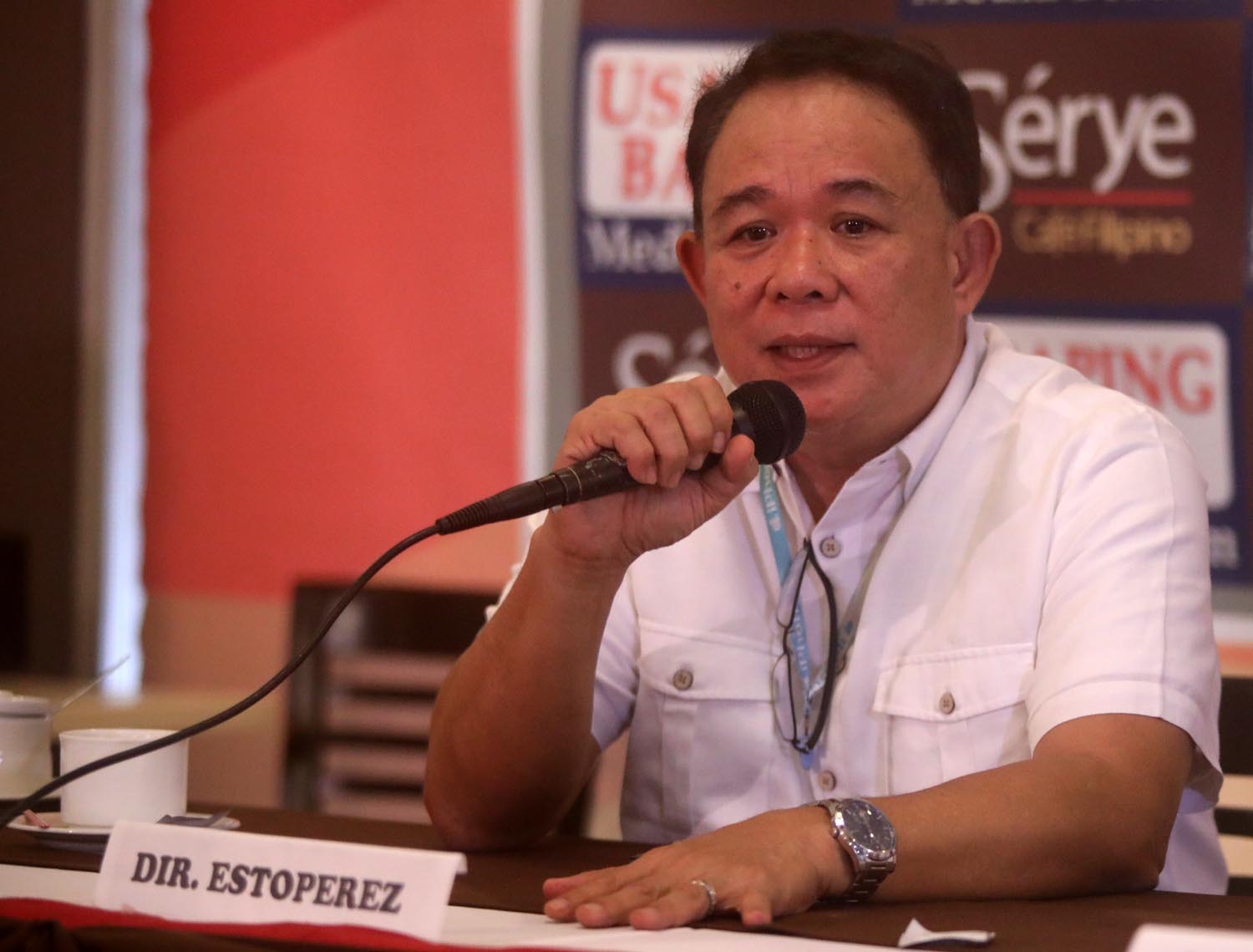 SAFE. National Food Authority Spokesperson Rex Estoperez assures consumers that weevil-infested rice will be safe to eat after fumigation. Photo by Darren Langit/Rappler 
