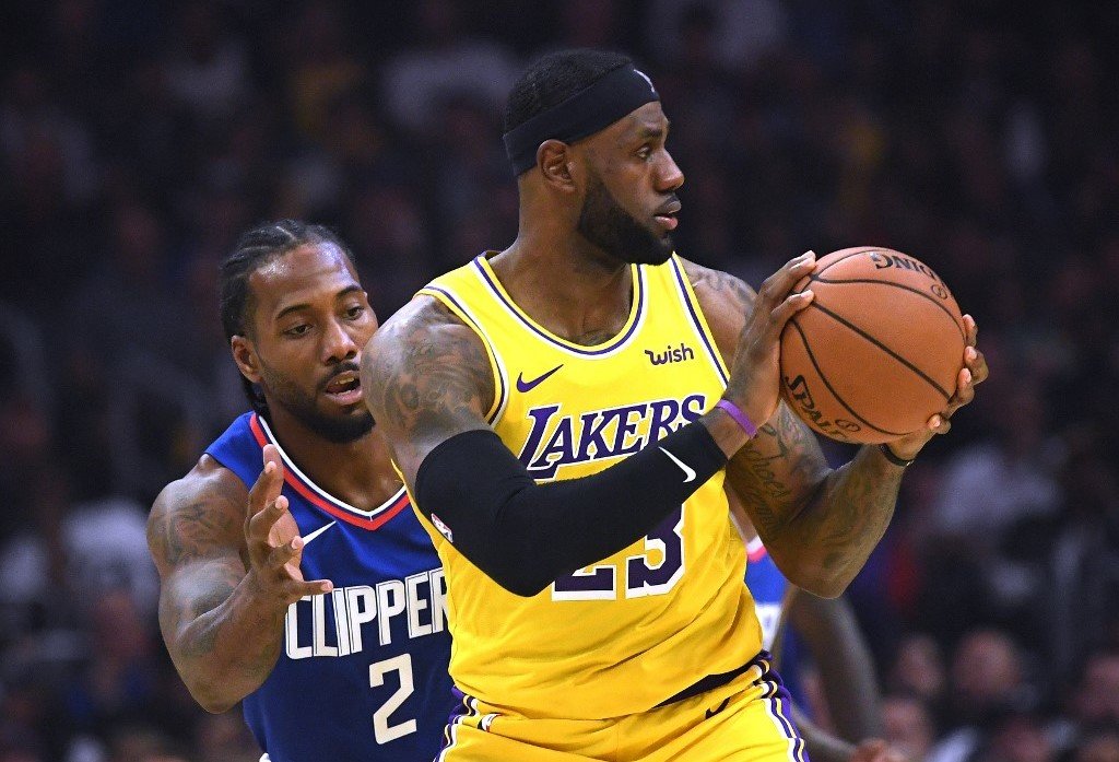 BUBBLE BATTLE. LeBron James’ Lakers and Kawhi Leonard’s Clippers resume their campaigns in the restart opener on July 30. Photo by Harry How/Getty Images/AFP 