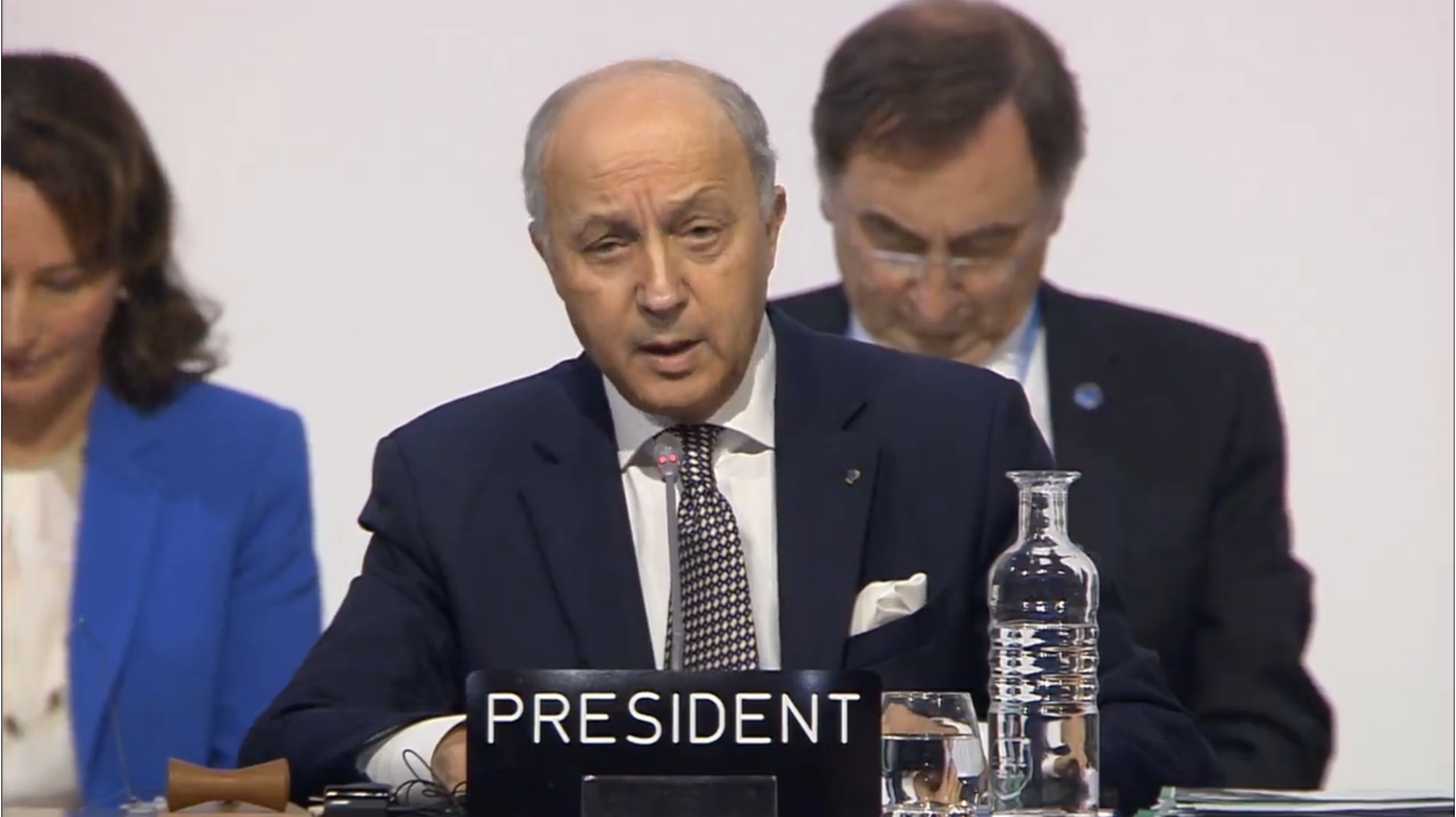 French Foreign Minister Laurent Fabius delivers a speech at the Comité de Paris plenary session during the UN climate change conference in Le Bourget, France, December 12, 2015. Framegrab from UNFCCC 